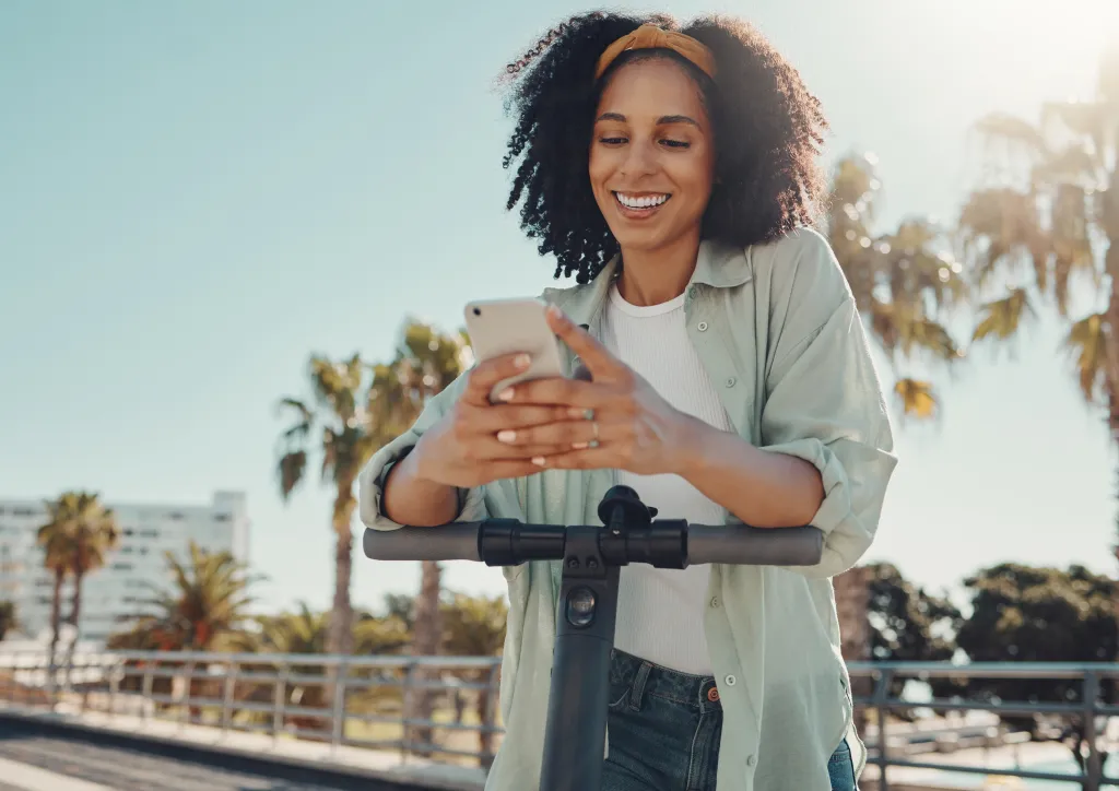 Woman smiling at her phone